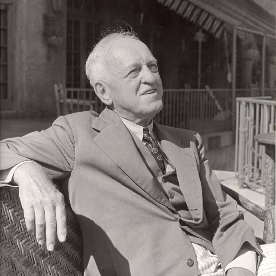 Black and white photograph of Samuel Henry Kress, seated outsite.